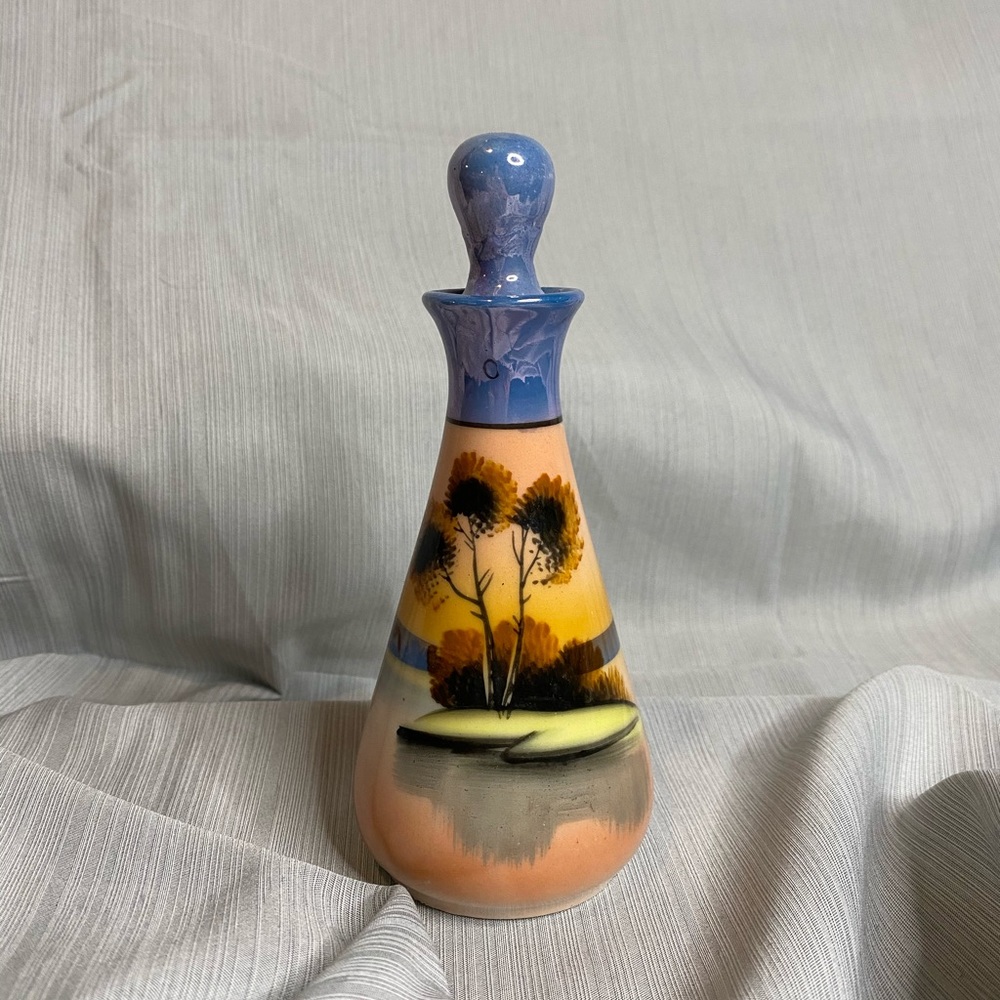 Vintage Lusterware oil container with stopper.